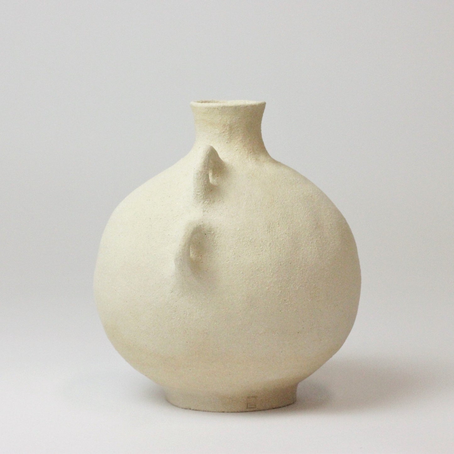 SANDSTONE WAVY HANDLED VASE I